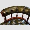 Pair of Victorian green leather tub chairs back detail