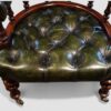 Pair of Victorian green leather tub chairs buttoned seats