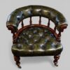 Pair of Victorian green leather tub chairs seat