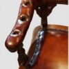 Victorian buttoned leather desk chair armrest