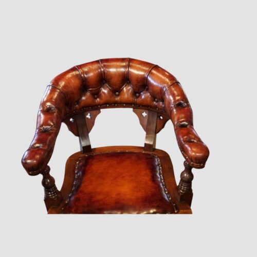 Victorian buttoned leather desk chair back detail