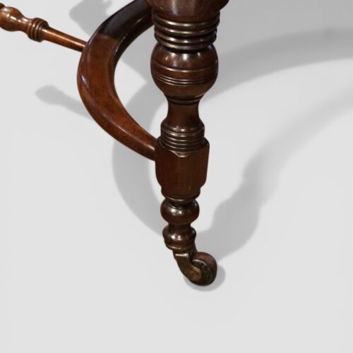 Victorian buttoned leather desk chair front leg detail