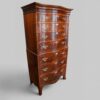 George V walnut serpentine tallboy at angle