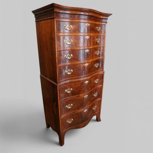George V walnut serpentine tallboy at angle