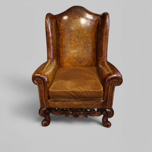 Pair of William and Mary leather wing chairs 1