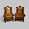 Pair of William and Mary leather wing chairs