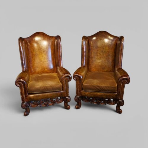 Pair of William and Mary leather wing chairs