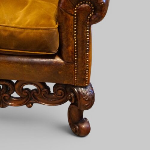Pair of William and Mary leather wing chairs arm