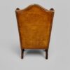 Pair of William and Mary leather wing chairs rear