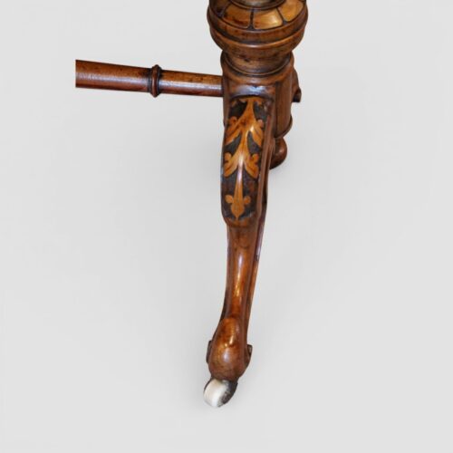 Victorian inlaid walnut window table leg carving detail