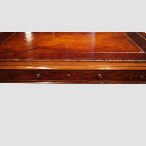 William IV mahogany 6 drawer writing table centre drawer