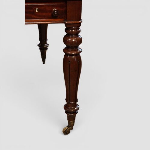 William IV mahogany 6 drawer writing table leg