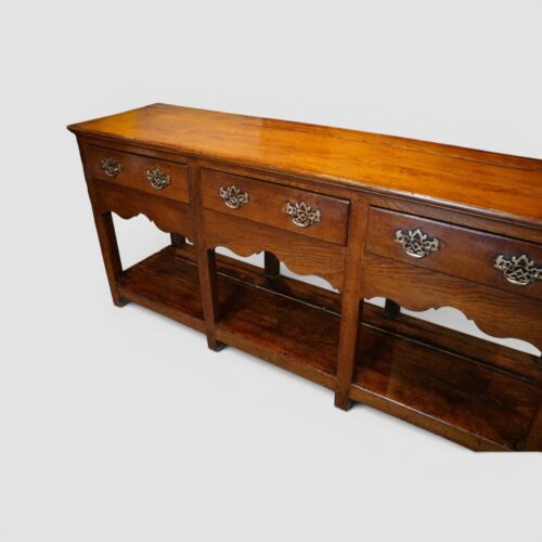 Antique oak pot board dresser base square legs front angle