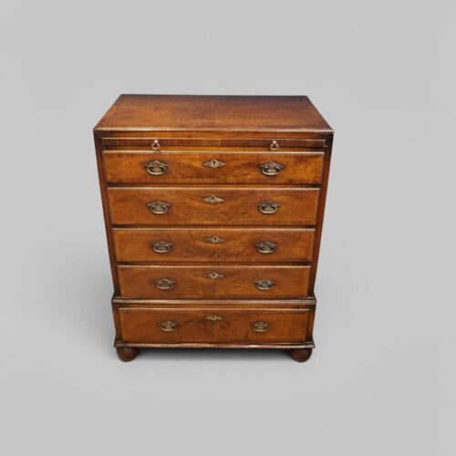 George I style walnut brushing slide chest