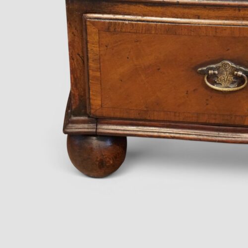 George I style walnut brushing slide chest bottom drawer
