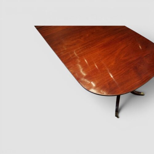 Antique mahogany triple pillar dining table corner