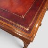 Victorian mahogany writing table corner tooling