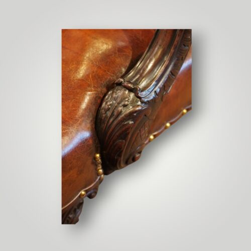 George III mahogany Gainsborough chair arm carving