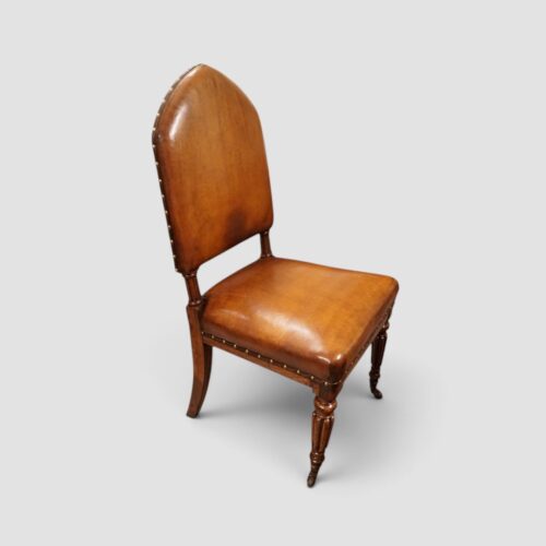 Side view of Gothic oak dining chair