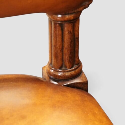 Victorian oak chair showing Gothic back detail