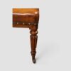 Close‑up of leather seat and studded edging