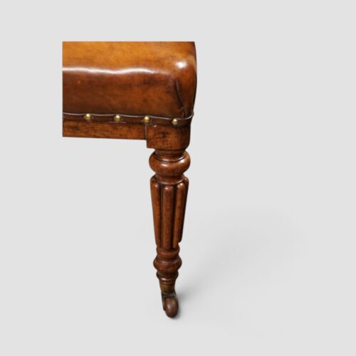 Close‑up of leather seat and studded edging