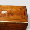 Victorian chest with brass‑bound edges and bell lock