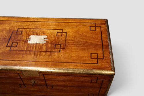 Victorian chest with brass‑bound edges and bell lock