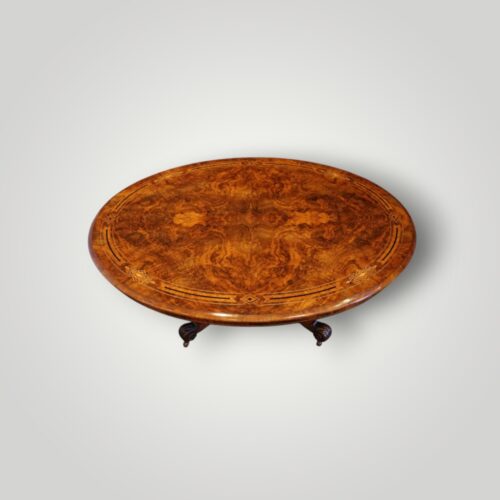 Antique Victorian inlaid burr walnut table viewed from above