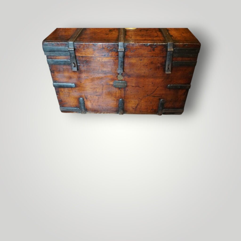 Patinated walnut surface of Waterloo trunk