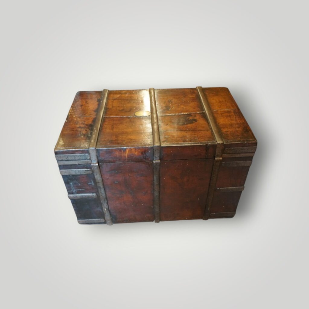 Walnut trunk with iron bindings and lock plate
