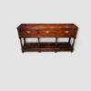 Antique oak dresser base with potboard shelf
