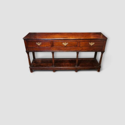 Antique oak dresser base with potboard shelf