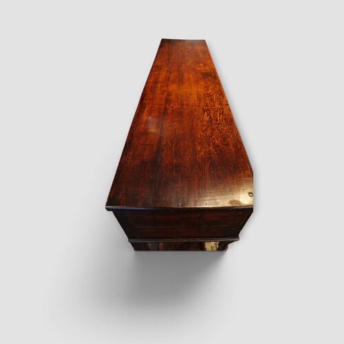 Top surface of antique oak dresser with aged finish
