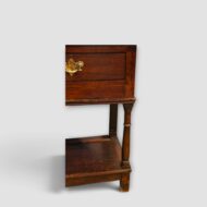 Turned legs supporting potboard on oak dresser base
