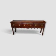 George III oak long dresser base with three drawers
