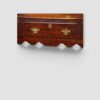 18th‑century oak dresser base showing shaped apron detail
