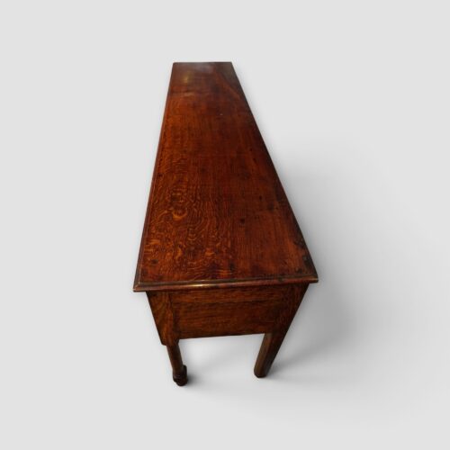 Antique Georgian dresser base with turned front legs