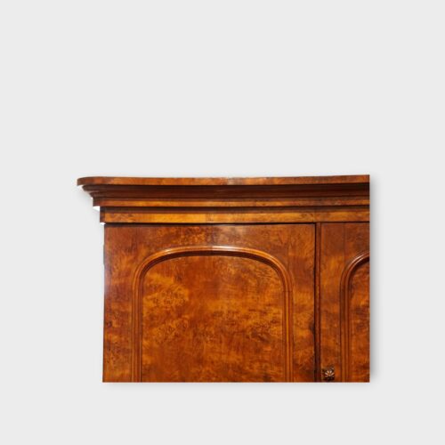 Antique walnut linen press with panelled doors