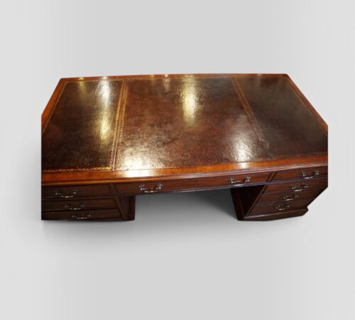 Victorian mahogany desk top surface detail